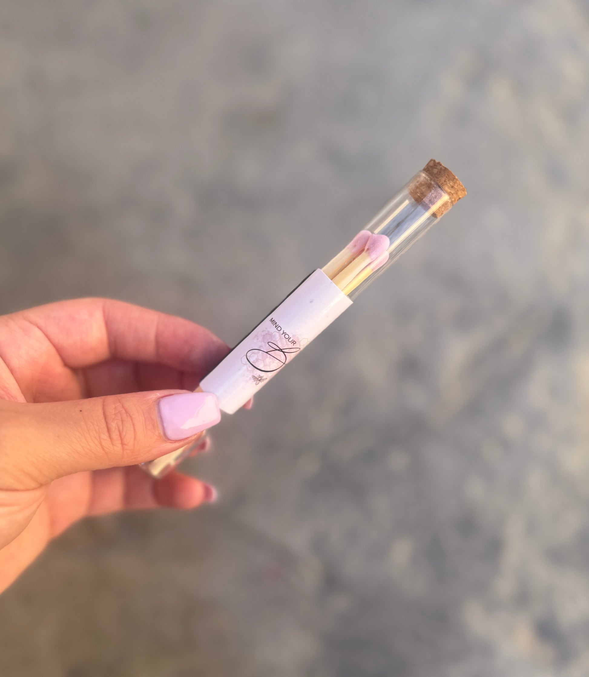 Custom matches, in a clear tube with pink label and wooden lid